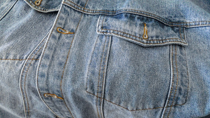 denim jacket pocket photographed close-up