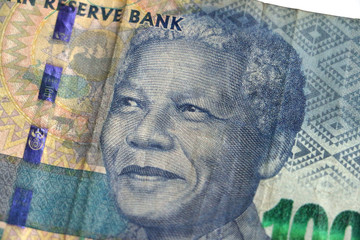 South African rand notes stacked piled up