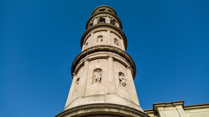 Fototapeta na wymiar Urgnano, Bergamo, Italy. View of the bell tower of the main church in the center of the village