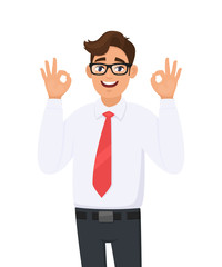 Handsome cheerful young business man showing/gesturing/making okay or ok sign with two hands and fingers. Human emotions, facial expressions, feelings concept illustration in vector cartoon style.