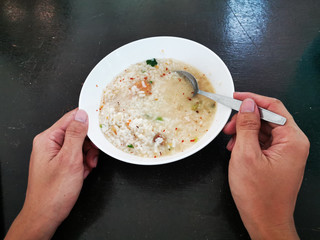 woman holding bowl of salad