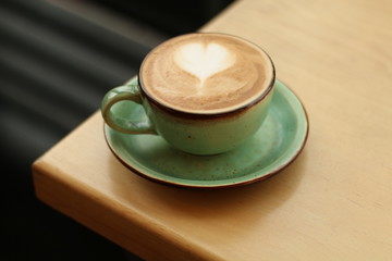 cup of coffee on table
