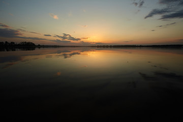 Obraz na płótnie Canvas Sunset Over the lake
