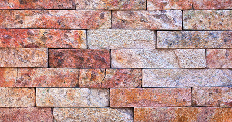 Wall of neatly laid out marble brick, background