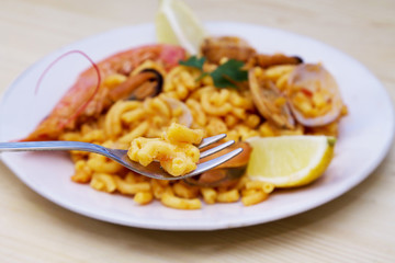 Fideua of seafood, clams, prawns and mussels