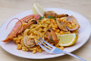 Fideua of seafood, clams, prawns and mussels