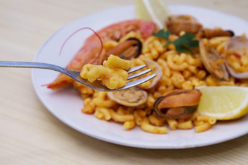 Fideua of seafood, clams, prawns and mussels