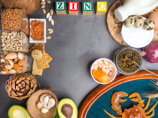 Foods with Zinc on concrete table. Top view
