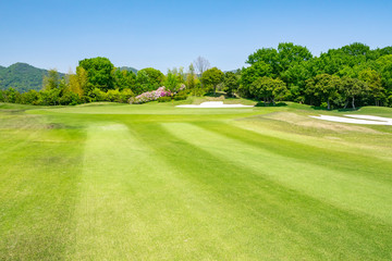 Panorama view of Golf Course with beautiful green field. Golf course with a rich green turf beautiful scenery.
