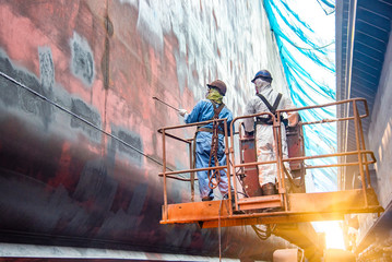 Steel basket carry by cherry picker crane for gang of worker power man, painting man or brush man...