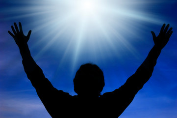 Prayer with divine rays of Light like religion, holy, spiritual concept 