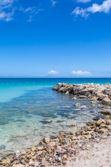 Fototapeta na wymiar Rocks and turquoise sea on the Caribbean island of Antigua