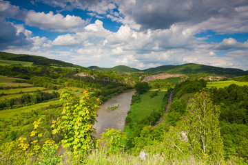 Fototapeta na wymiar View from the hill into the valley with the Berounka river.