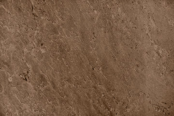 Close up of abstract brown granite stone texture