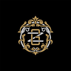 Initial letter Z and G, ZG, GZ, decorative ornament emblem badge, overlapping monogram logo, elegant luxury silver gold color on black background