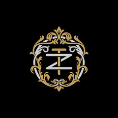 Initial letter Z and T, ZT, TZ, decorative ornament emblem badge, overlapping monogram logo, elegant luxury silver gold color on black background