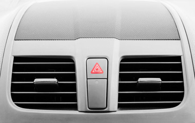 Emergency stop button red triangle inside the car