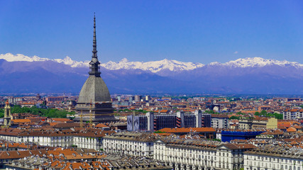Turin, Torino, aerial timelapse skyline panorama with Mole Antonelliana, Monte dei Cappuccini and the Alps in the background. Italy, Piemonte, Turin.