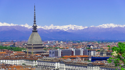 Turin, Torino, aerial timelapse skyline panorama with Mole Antonelliana, Monte dei Cappuccini and the Alps in the background. Italy, Piemonte, Turin.