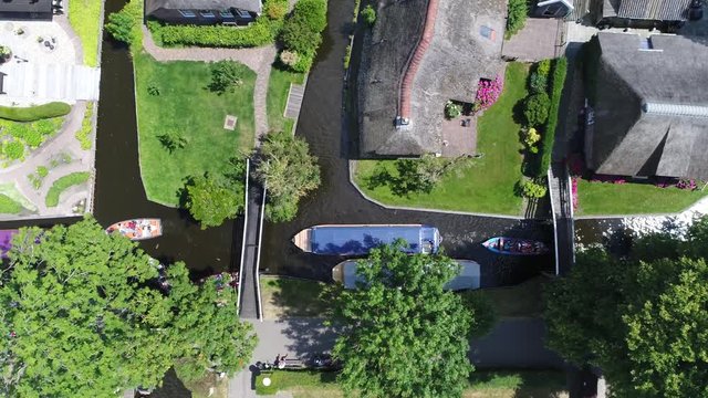 Aerial top down view of Giethoorn is a Dutch town in the province of Overijssel the Netherlands and is located in the municipality of Steenwijkerland and is often referred to as Little Venice 4k