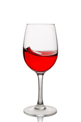 Red wine in a glass isolated on white background. Side view.