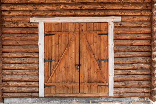 wild west - Log cabin wall with a doorway locked gate