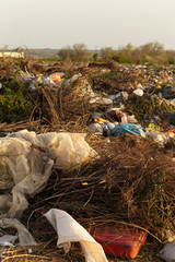 Environmental disaster. Clogging the outskirts of the city. Garbage heaps are an element of the modern European landscape. © Piotr