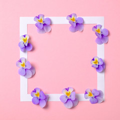 Naklejka na ściany i meble Flat lay frame with flower petals on watercolor spring background. Top view, floral frame, abstract design. Invitation, greeting card or an element for your design.