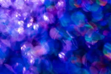 Rainbow blue glitter festive background with bokeh lights. Celebration concept for Holidays and anniversary.