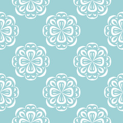 Fototapeta na wymiar Floral seamless background. White design on blue backdrop