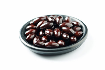 Vitamin C with Bioflavonoids and Rose Hips. White background. Close up. Copy space.  
