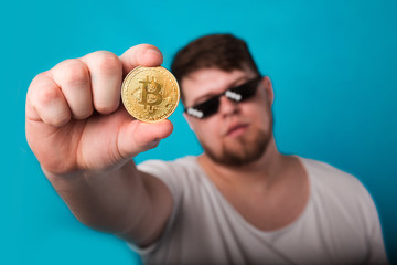 cool guy with a coin in his hand