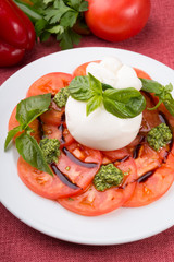 Buffalo burrata cheese served with fresh raw tomatoes