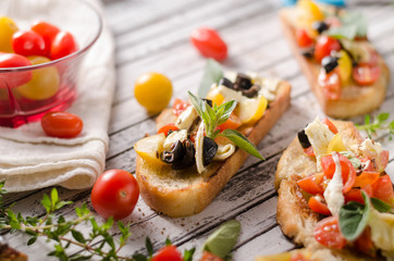Crostini with tomatoes and olives