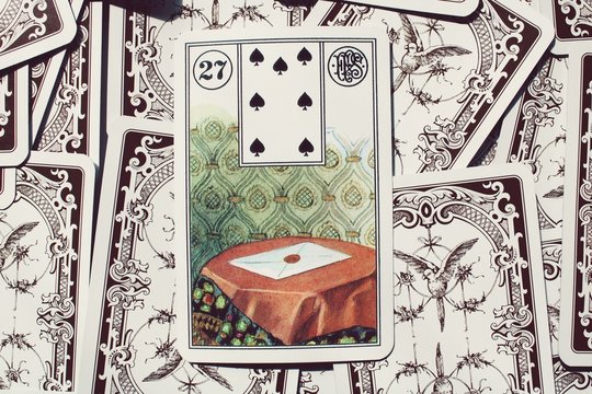 Letter in fortune telling  card deck 