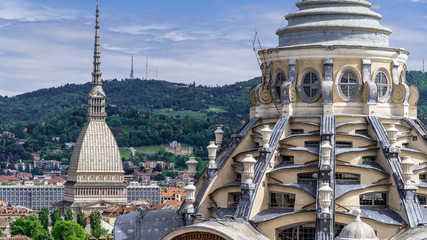 Turin, Torino, aerial timelapse skyline panorama with Mole Antonelliana, Monte dei Cappuccini and the Alps in the background. Italy, Piemonte, Turin.