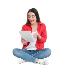 Fototapeta premium Woman using tablet for video chat isolated on white