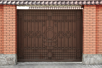 Metal gates with forged elements in modern cottage