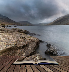 Stunning long exposure landscape image of Wast Water in UK Lake District coming out of pages in...