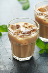 iced latte coffee in a glass with cold milk. Summer drink