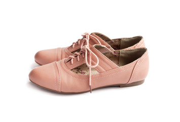 Pair of female shoes on white background