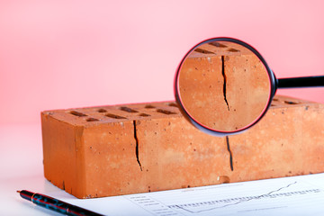 Bad brick. Defect construction. Broken product in manufacturing.
