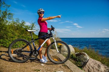 Fototapeta na wymiar Young woman cycling