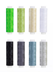 Set of sewing thread coils, miscellaneous colours, isolated on white