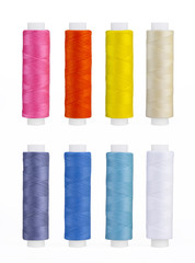 Set of sewing thread coils, miscellaneous colours, isolated on white