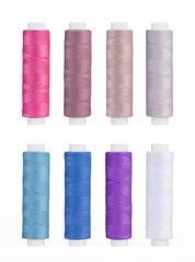 Set of sewing thread coils, miscellaneous colours, isolated on white