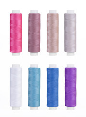 Set of sewing thread coils, miscellaneous colours, isolated on white