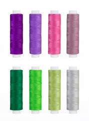 Set of sewing thread coils, miscellaneous colours, isolated on white