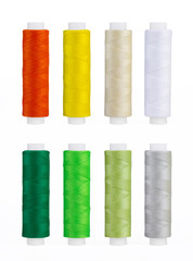 Set of sewing thread coils, miscellaneous colours, isolated on white
