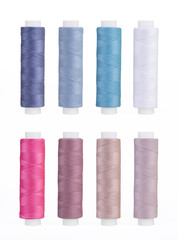 Set of sewing thread coils, miscellaneous colours, isolated on white
